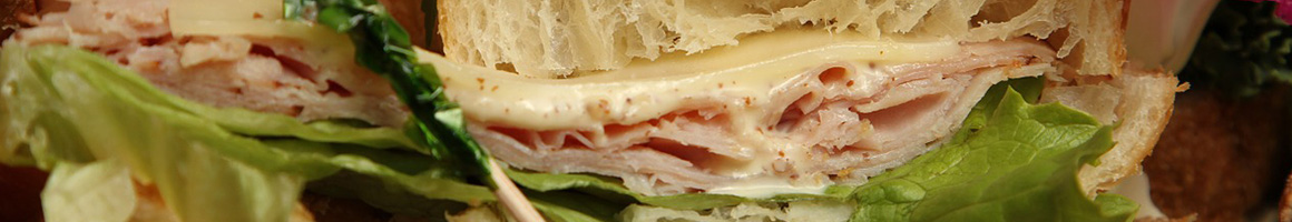 Eating Italian Pizza Sandwich at Fabio's Pizza restaurant in Atco, NJ.